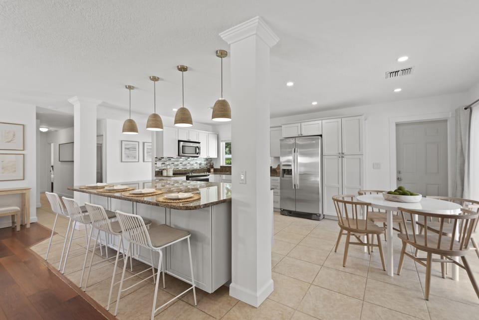 With the spacious kitchen and dining area, there is plenty seating for 8 guests.