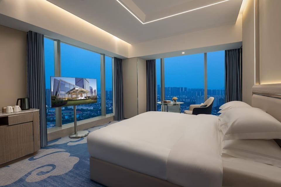 Deluxe Room, Multiple Beds | Premium bedding, pillowtop beds, in-room safe, blackout drapes
