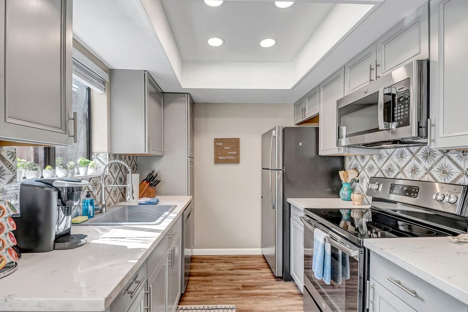 Spacious Kitchen Area with Stainless Steel Appliances