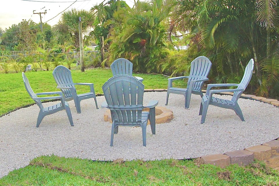 Gather Adirondack style, around the backyard fire pit.