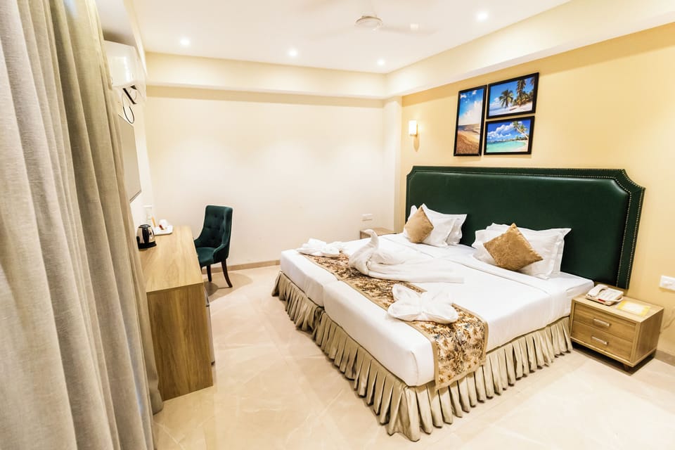 Superior Twin Room | Minibar, in-room safe, individually decorated, individually furnished