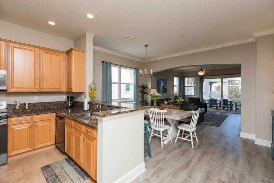 View from the Kitchen thru the Dining Room and living room to the 24' Balcony