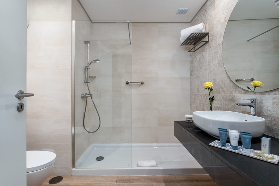 Double or Twin Room, Sea View | Bathroom | Shower, free toiletries, hair dryer, towels