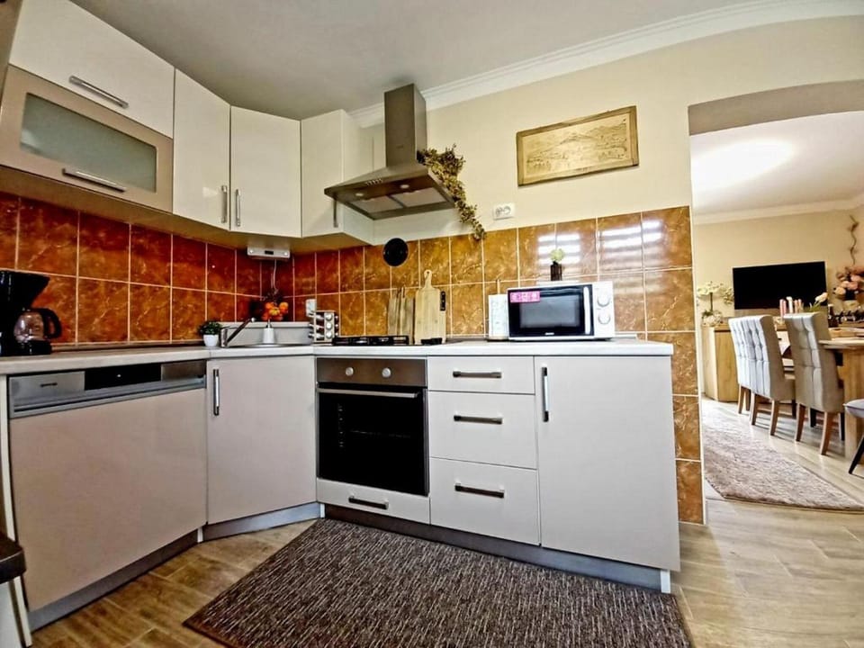 House (Two Bedroom Holiday Home with Hot Tub) | Private kitchen | Fridge