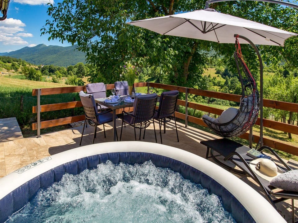 House (Two Bedroom Holiday Home with Hot Tub) | Outdoor spa tub
