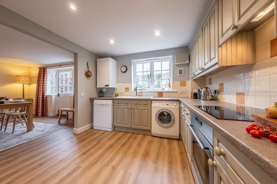 Ground floor: Kitchen with dining room in the distance