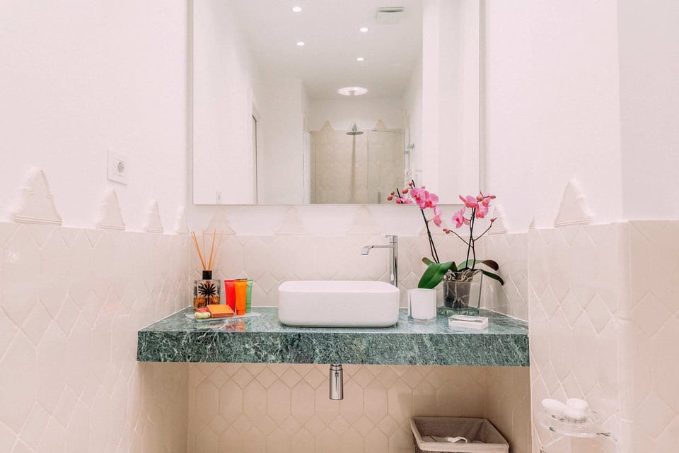 Exclusive Studio Suite | Bathroom | Separate tub and shower, jetted tub, hair dryer, bidet
