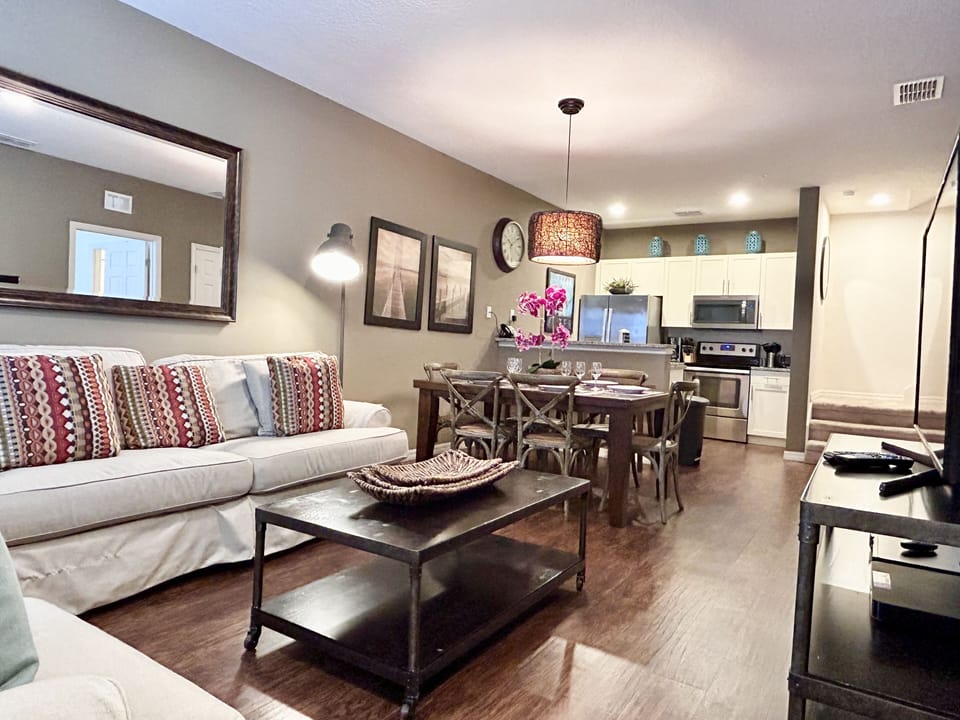 Cozy living room with smart TV and beautiful decor.