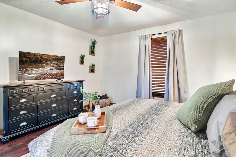 Unwind in complete comfort as you binge your favorite shows from the luxury of a plush king-sized bed, streaming from a Roku TV. Enjoy a full dresser to store your clothes!
