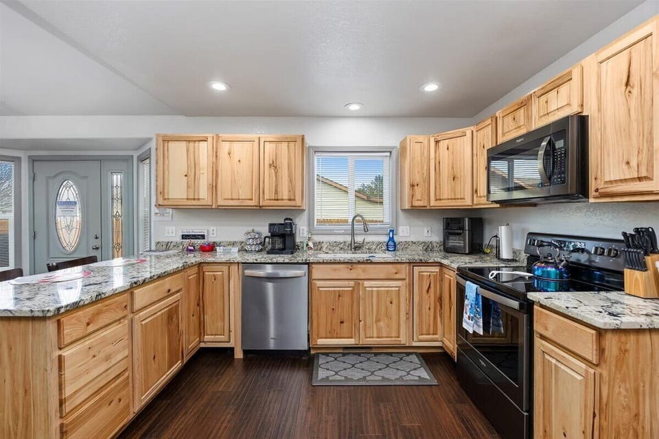 Fully stocked kitchen with modern appliances