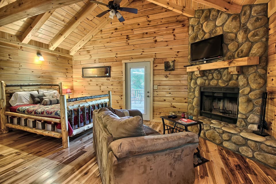Closer detail of Sitting area, Fireplace and Bed