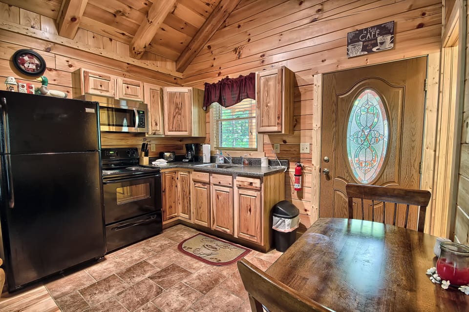 Closeup of Dining Table and Full Kitchen