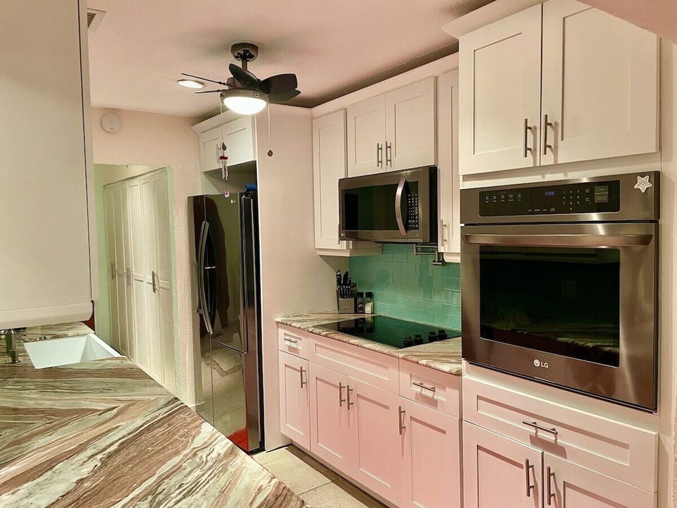 Whether you aspire to create intricate dishes or simply revel in the joy of culinary exploration, this kitchen stands as a testament to the seamless fusion of style and functionality. Spices and pantry items are included.