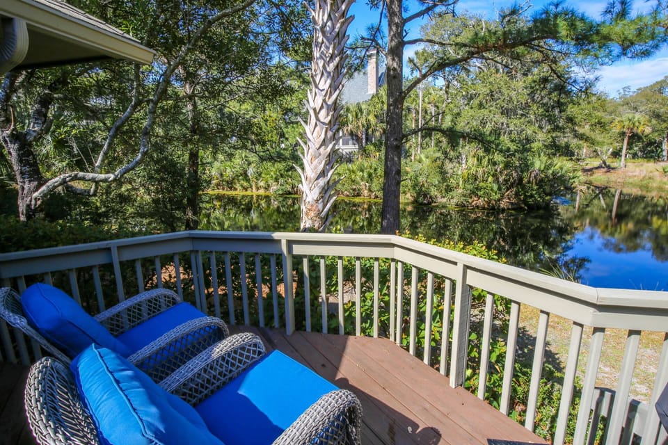 Surfscoter features a spacious back deck and lagoon views.