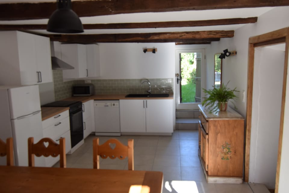 Fully fitted kitchen with access to garden