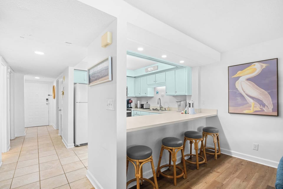 his spacious kitchen serves up ocean views right from the stove—perfect for whipping up your favorite meal with a side of sea breeze and sunshine.