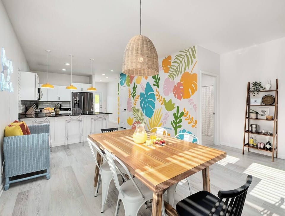 Dining room area with seating for 9 guests.