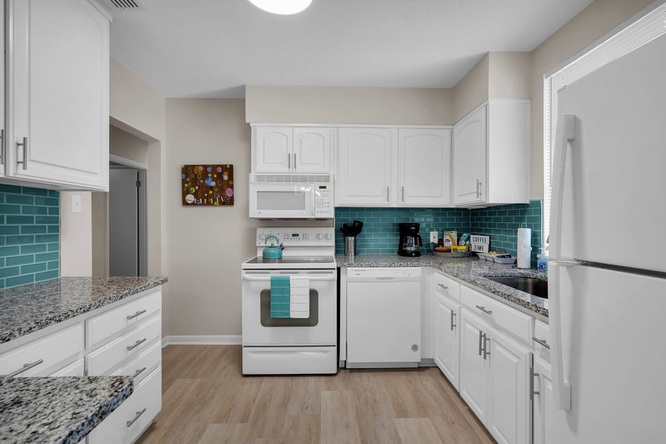Fully equipped kitchen with all the basic items needed for light meal preps