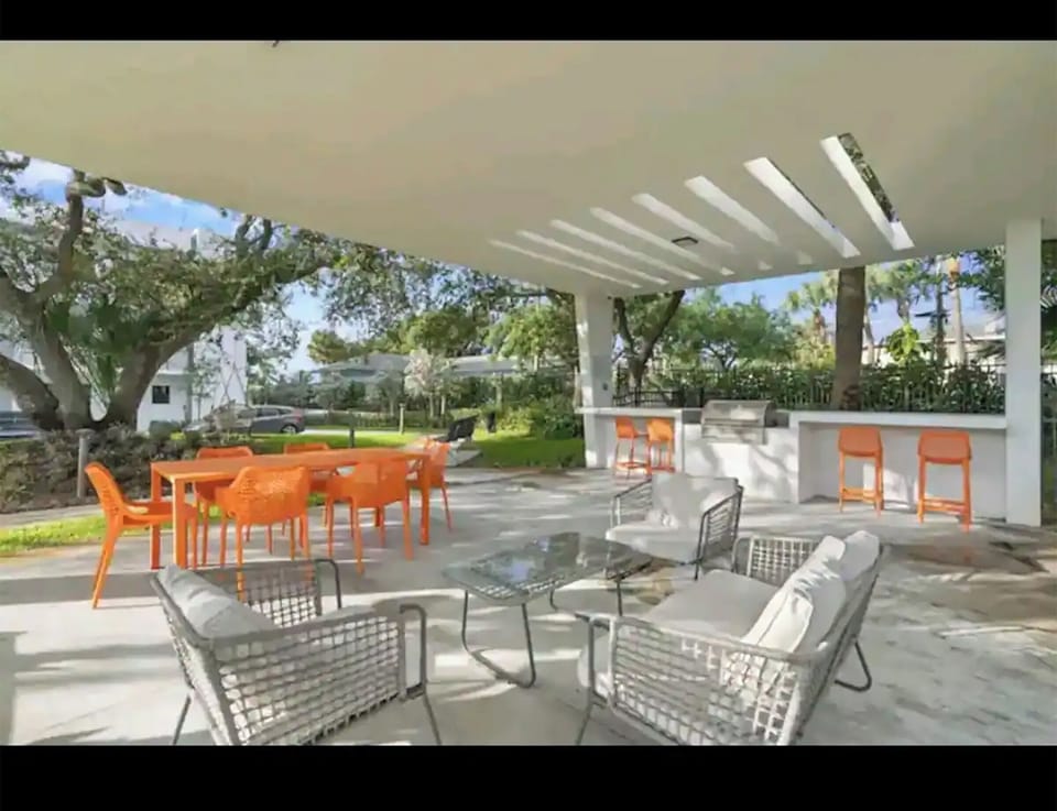 Outside dining area with grill