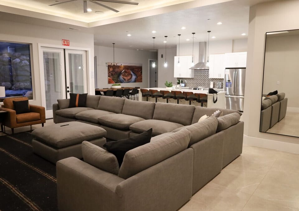 Living Area with Sectional Couch, Large Smart TV and Gas Fireplace