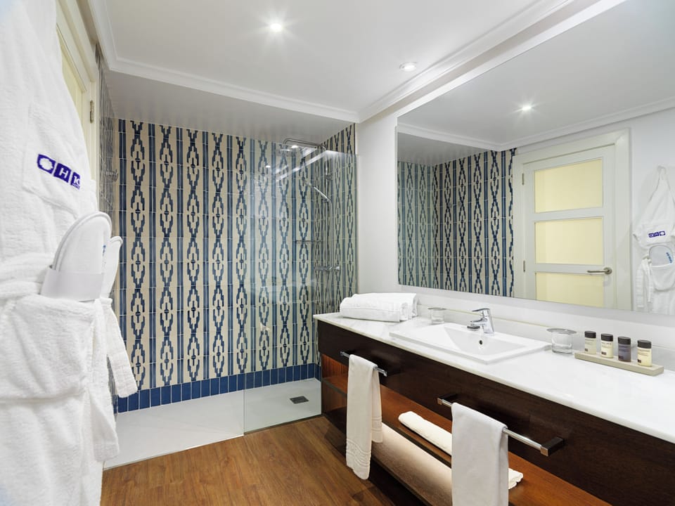 Combined shower/tub, eco-friendly toiletries, hair dryer, bathrobes
