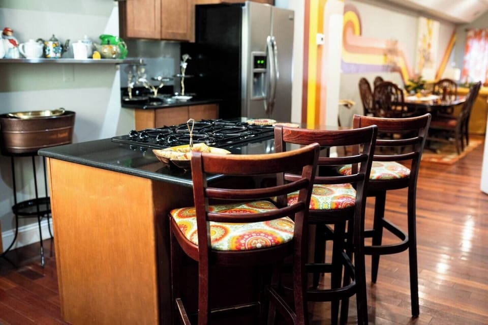 Our kitchen boasts modern appliances among retro vibes