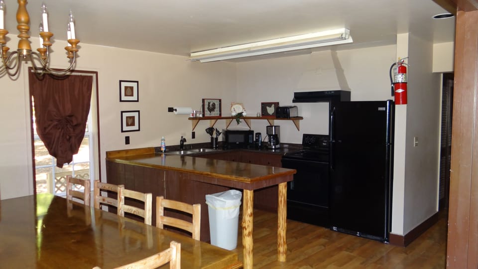 Premium Cabin, 2 Double Beds, Non Smoking, Kitchen (Linens Included, No Pets Allowed) | Private kitchen | Fridge, coffee/tea maker, cookware/dishes/utensils
