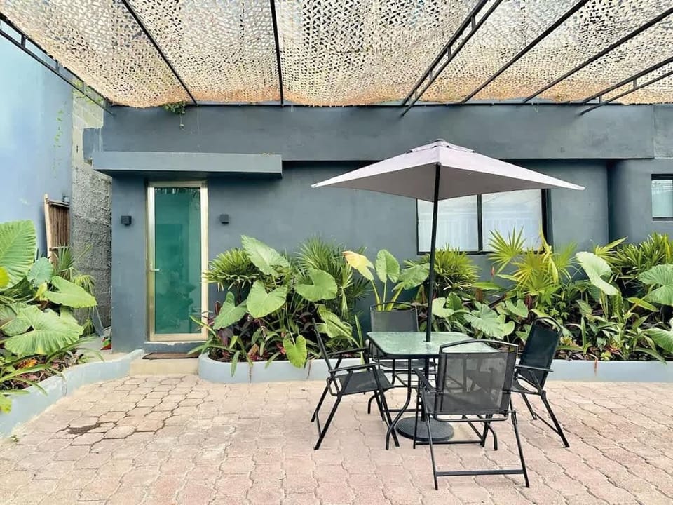 Shared outdoor terrace with greenery