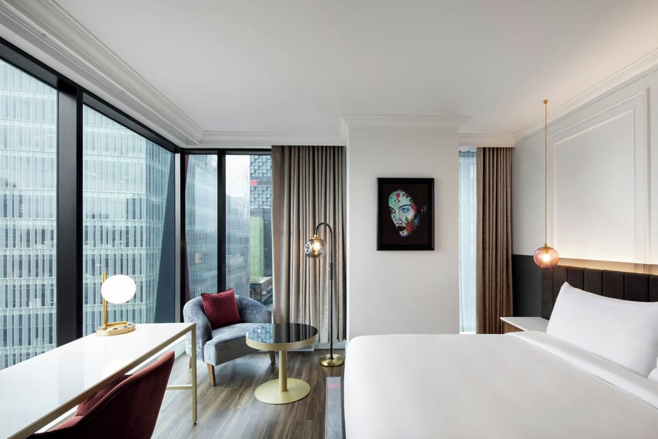Standard Room, 1 King Bed, City View | Minibar, in-room safe, desk, laptop workspace