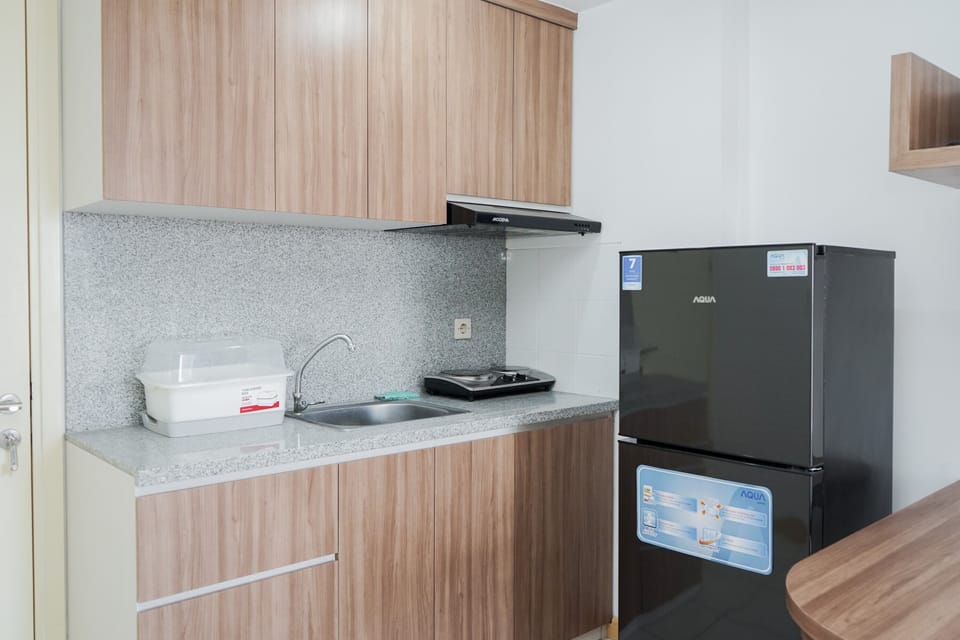 Deluxe Apartment, 3 Bedrooms | Private kitchen | Full-size fridge, stovetop