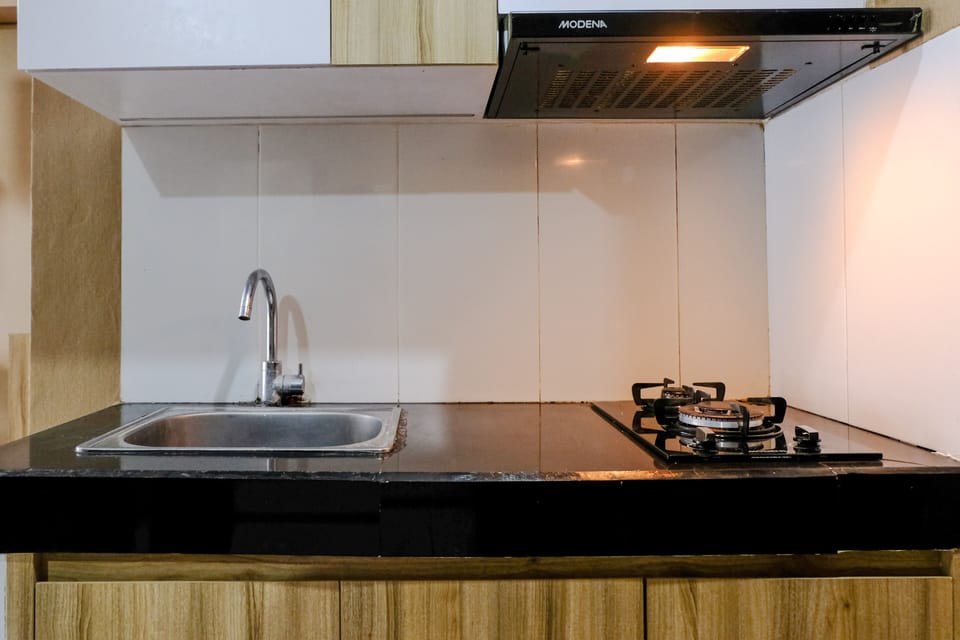 Deluxe Apartment, 2 Bedrooms | Private kitchen | Full-size fridge, stovetop