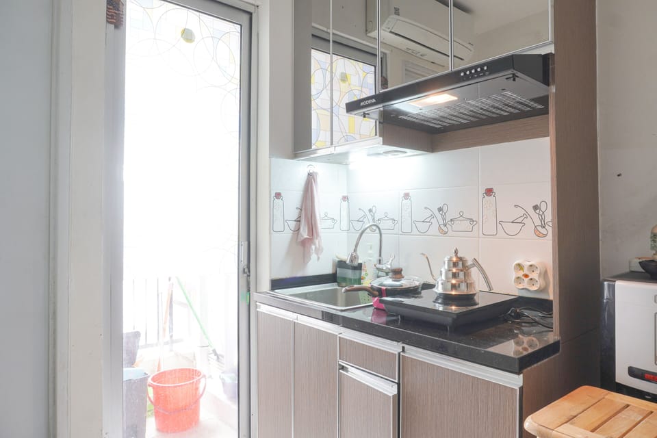 Deluxe Apartment, 2 Bedrooms | Private kitchen | Full-size fridge, stovetop