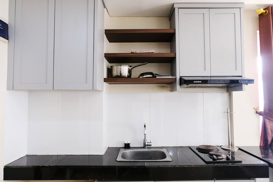 Deluxe Apartment, 3 Bedrooms | Private kitchen | Full-size fridge, stovetop