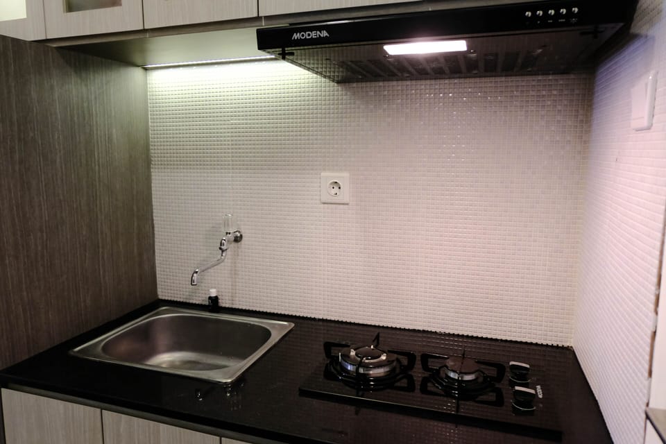 Deluxe Apartment, 1 Bedroom | Private kitchen | Full-size fridge, stovetop