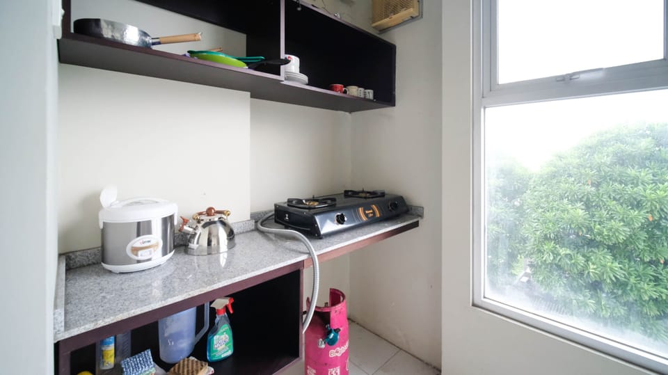 Deluxe Apartment, 2 Bedrooms | Private kitchen | Full-size fridge, stovetop, electric kettle