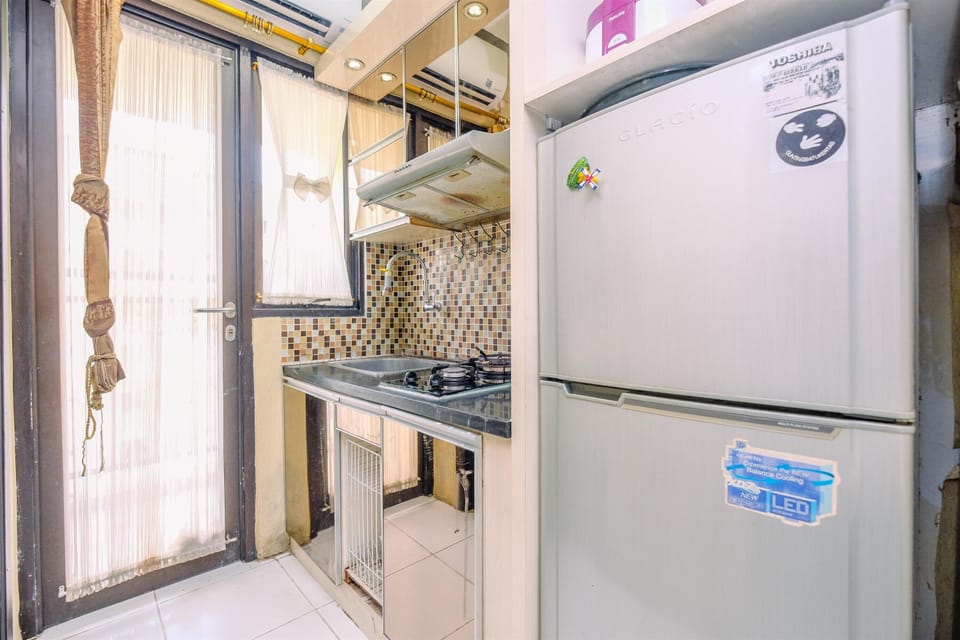 Deluxe Apartment, 2 Bedrooms | Private kitchen | Full-size fridge, stovetop