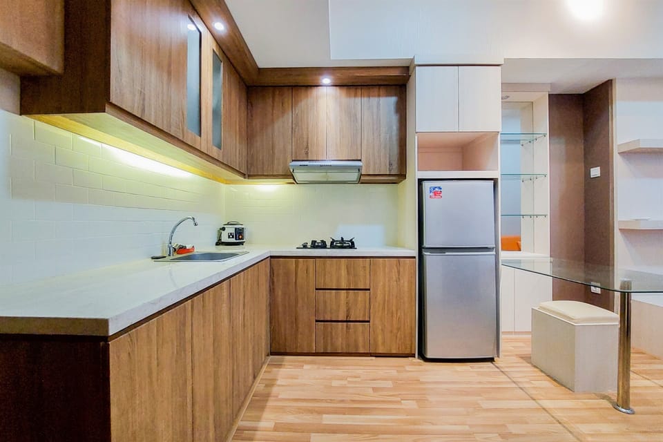 Deluxe Apartment, 1 Bedroom | Private kitchen | Full-size fridge, stovetop