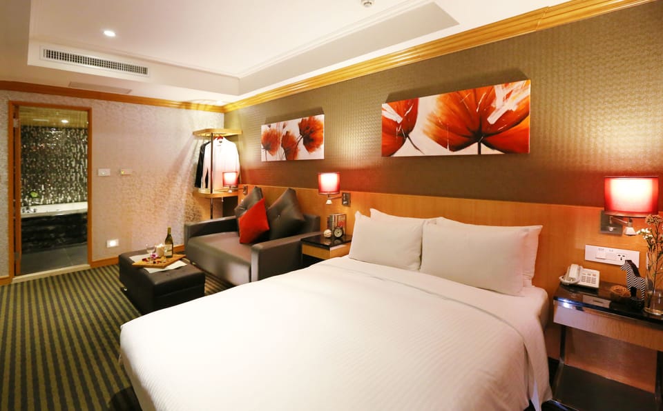 Executive Double Room | Down comforters, free minibar, desk, iron/ironing board
