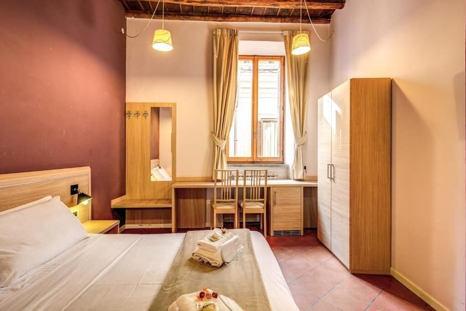 Deluxe Room | Minibar, desk, WiFi (free), bed sheets