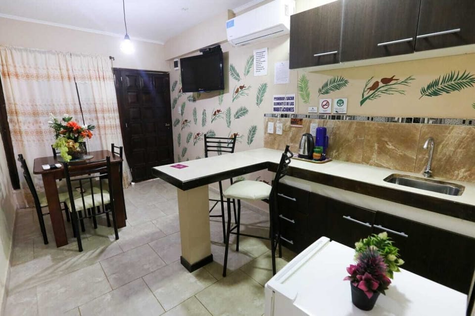 Mini-fridge, cookware/dishes/utensils