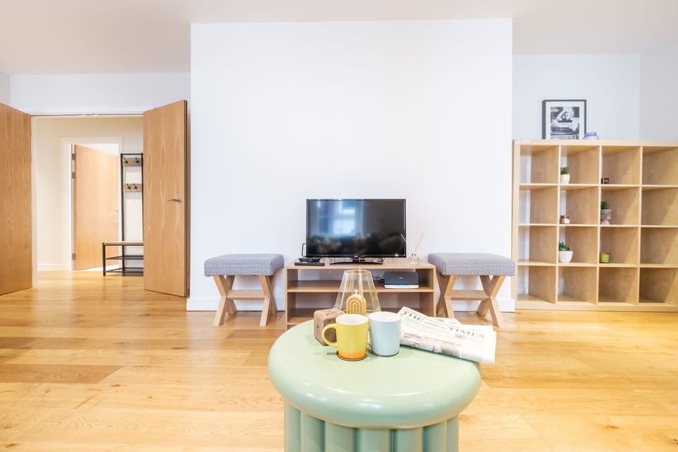 City Apartment, 2 Bedrooms, Non Smoking | Living area | 40-inch Smart TV with cable channels, TV, heated floors
