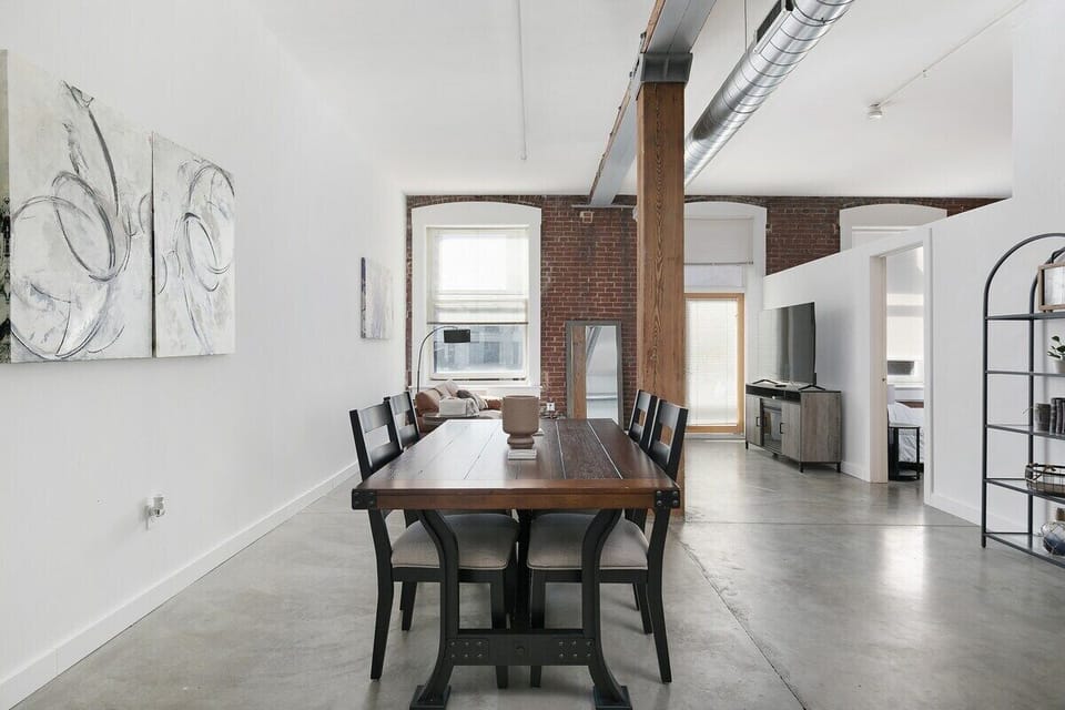 Dining area with an open concept and accompanying chairs