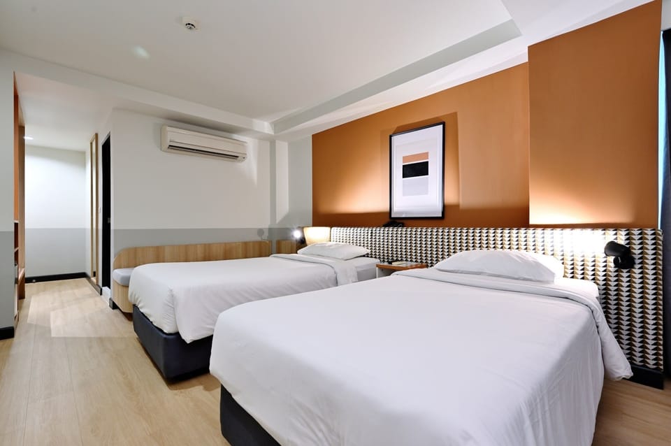Deluxe Room, 1 Bedroom | In-room safe, rollaway beds, free WiFi, bed sheets