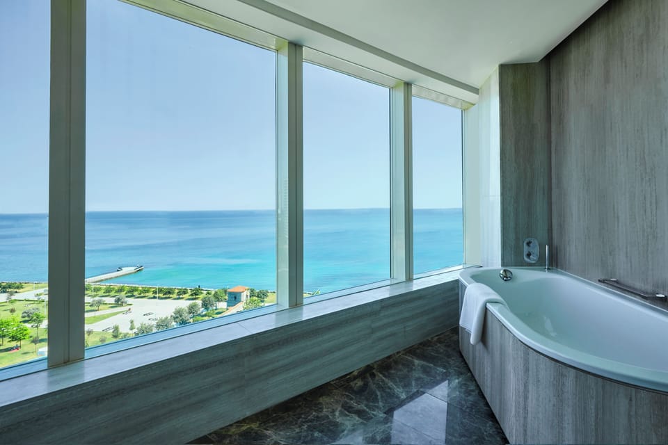 Deluxe Room, 1 King Bed, Sea View | Premium bedding, minibar, in-room safe, desk