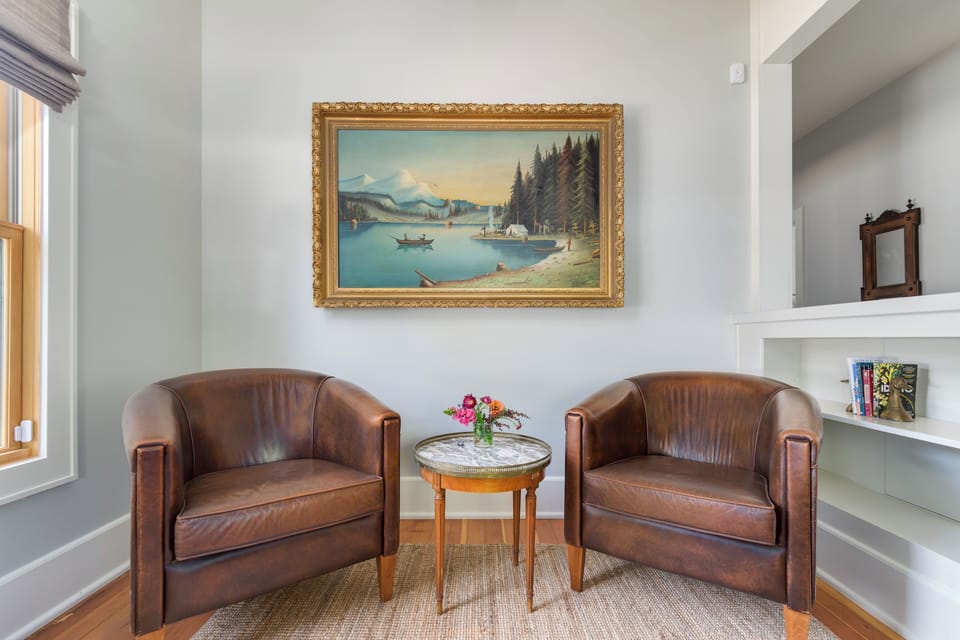 Early 1900s painting of the Oregon countryside in the parlor.