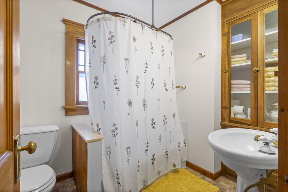 Upstairs hallway bathroom.  Shower tub.