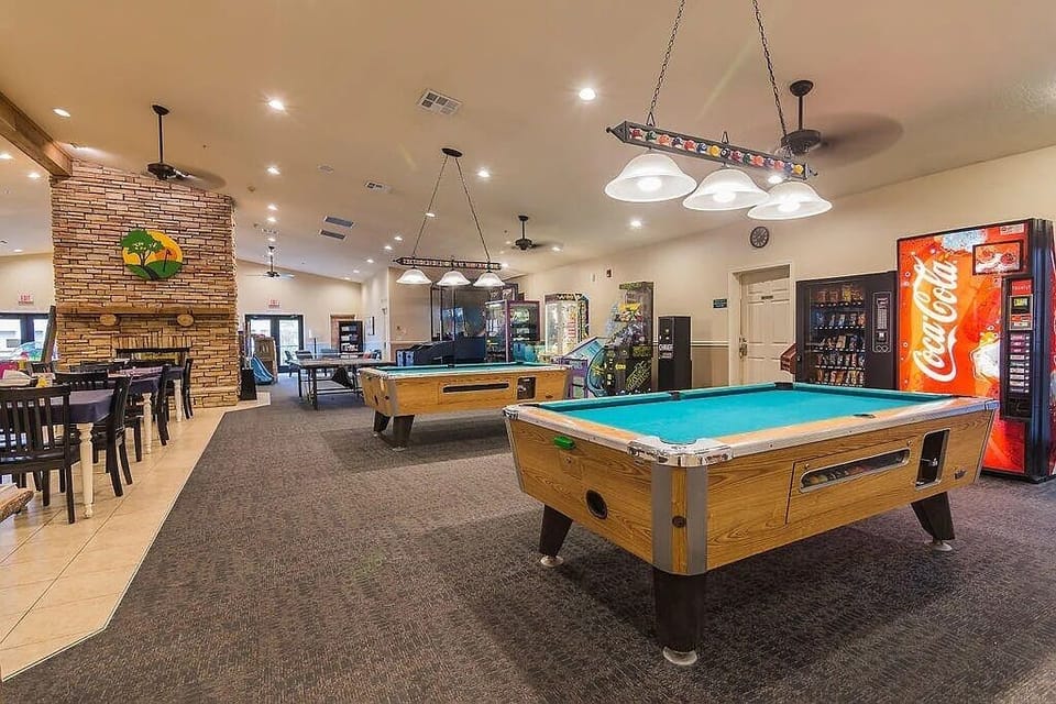 Game room, including pools tables, skee ball, and arcade games for the kids