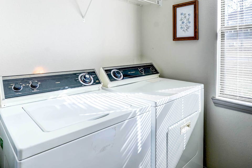 In-Unit Laundry | Main Level | Washer + Dryer | Iron/Board