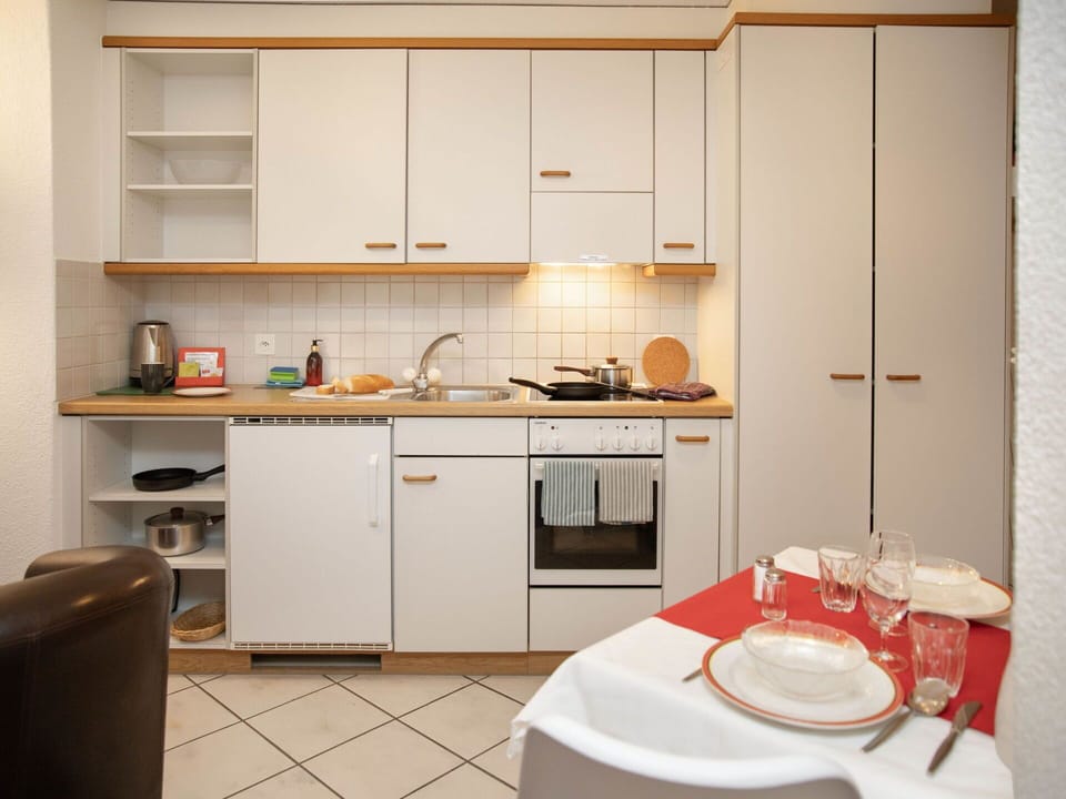 Kitchen, Kitchen Appliance, Countertop, Furniture, Interior Design, Major Appliance, Cabinetry, Wood, Flooring, Room