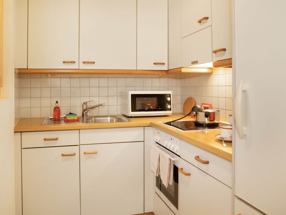 Kitchen, Kitchen Appliance, Countertop, Major Appliance, Cabinetry, Wood, Interior Design, Furniture, Flooring, Kitchen Sink